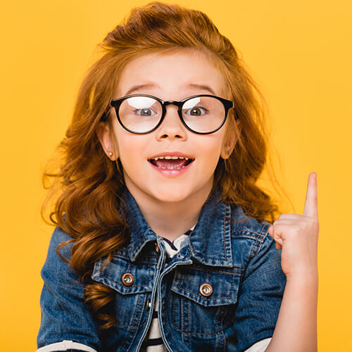 girl with glasses pointing